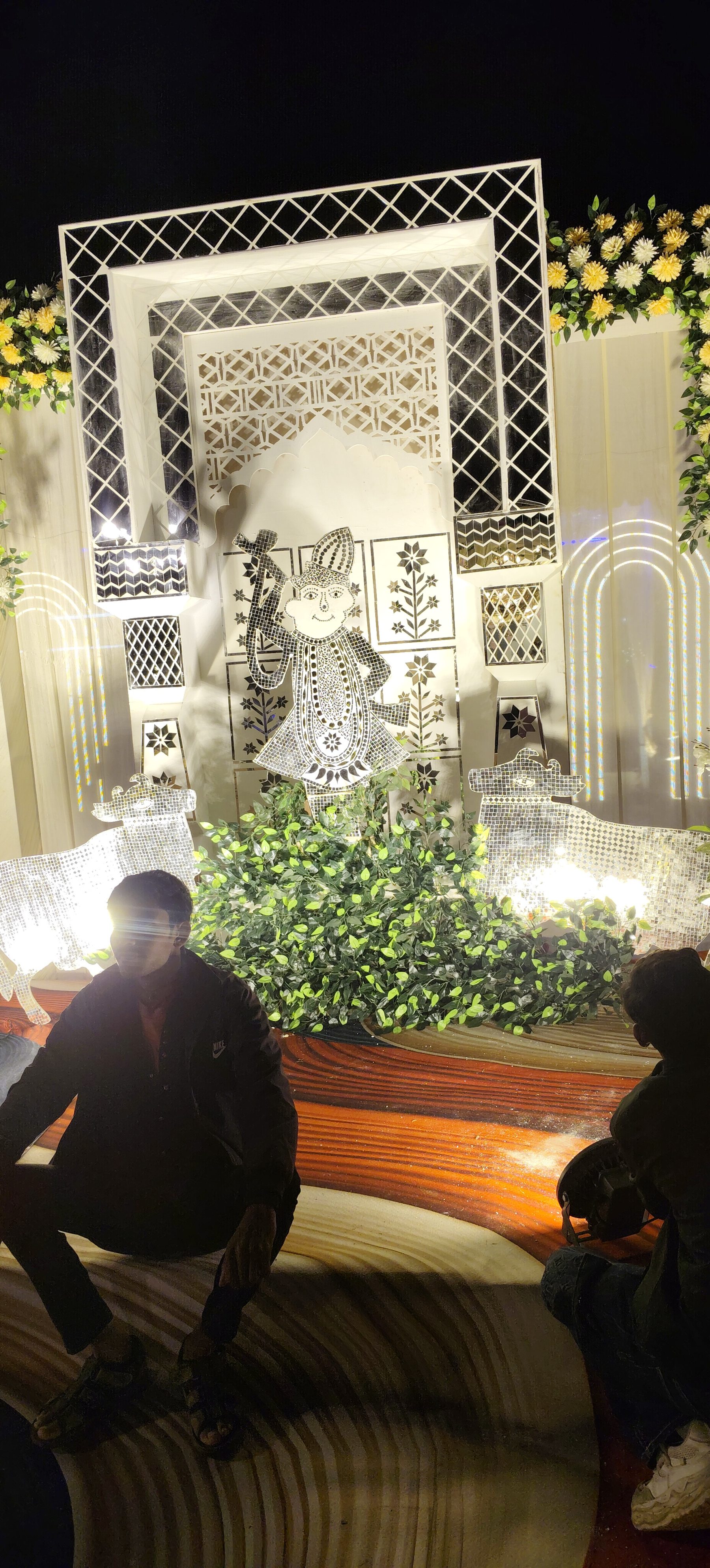 Traditional mirror-work décor backdrop at Rao Marriage Home