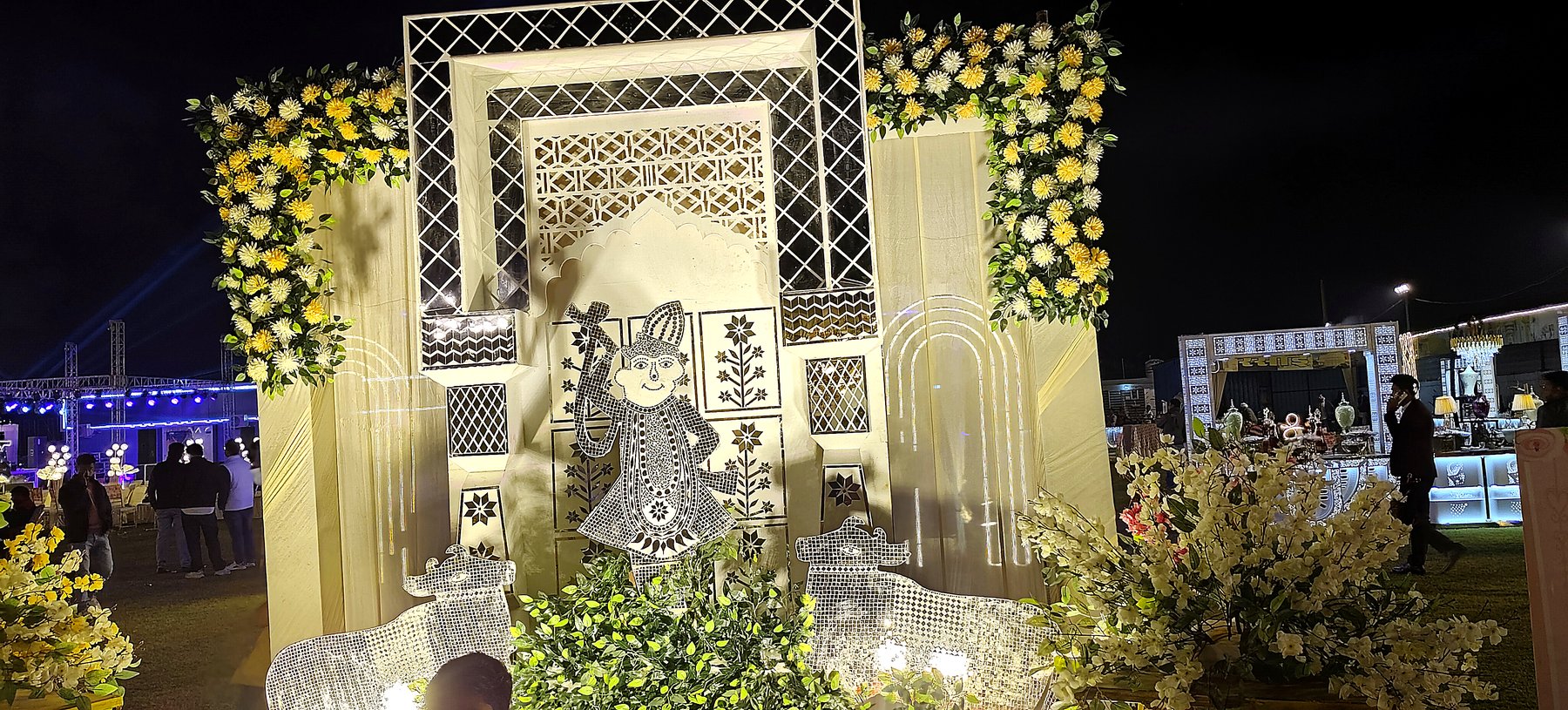 Mirror-work Krishna backdrop at Rao Marriage Home